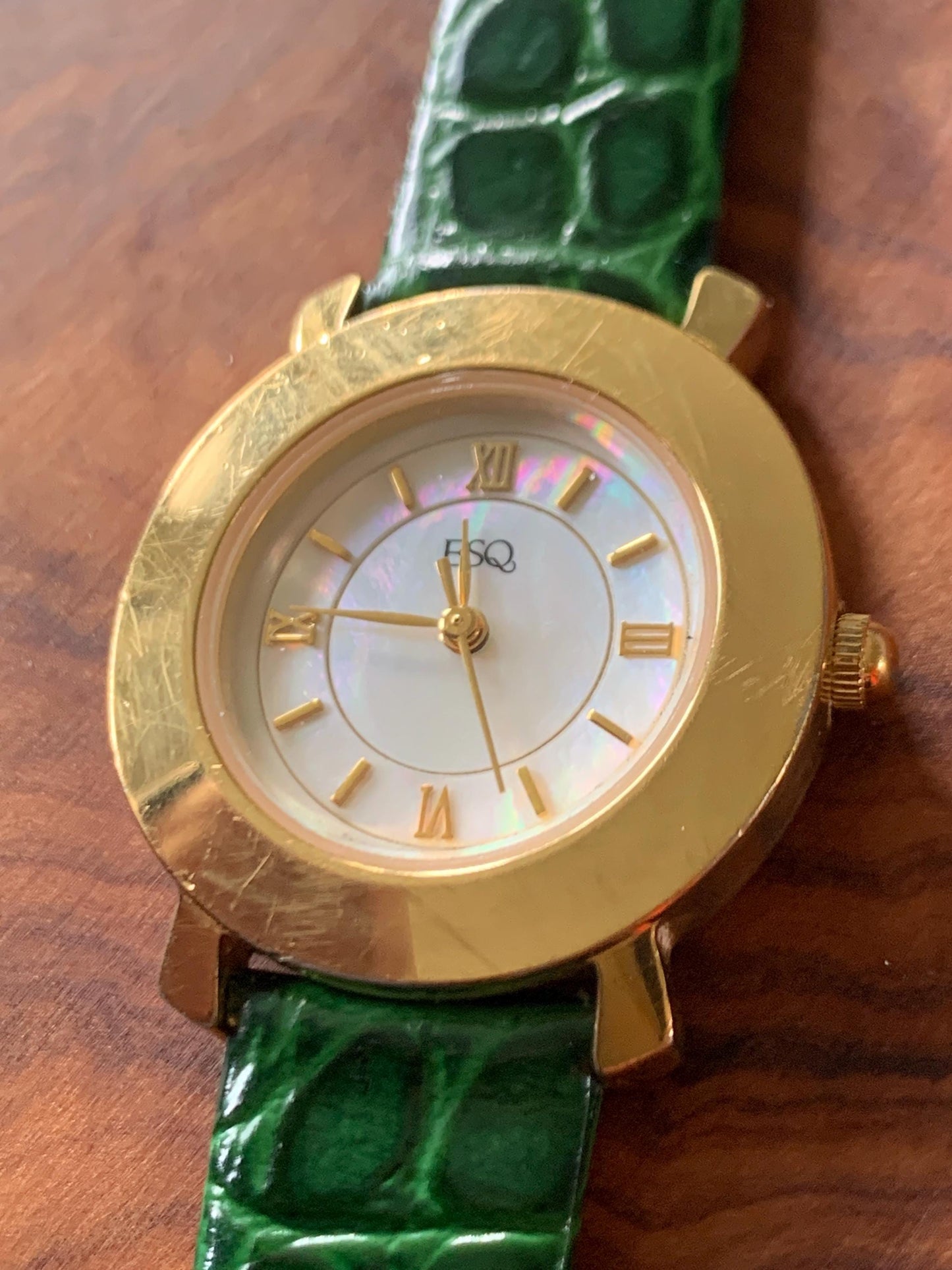Modernist ESQ (by Movado) Roman Mother of Pearl Dial, Gold Tone Fancy Lugs, 90s, New Crocodile Pattern Green Band. 28mm. Swiss ETA Movement.