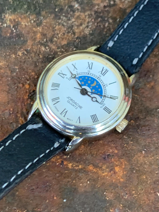 Jordache Moon Motif Watch - Women's FIXED Moon Motif Dial Design:  New battery, vintage leather strap. Roman Dial, Good Condition.