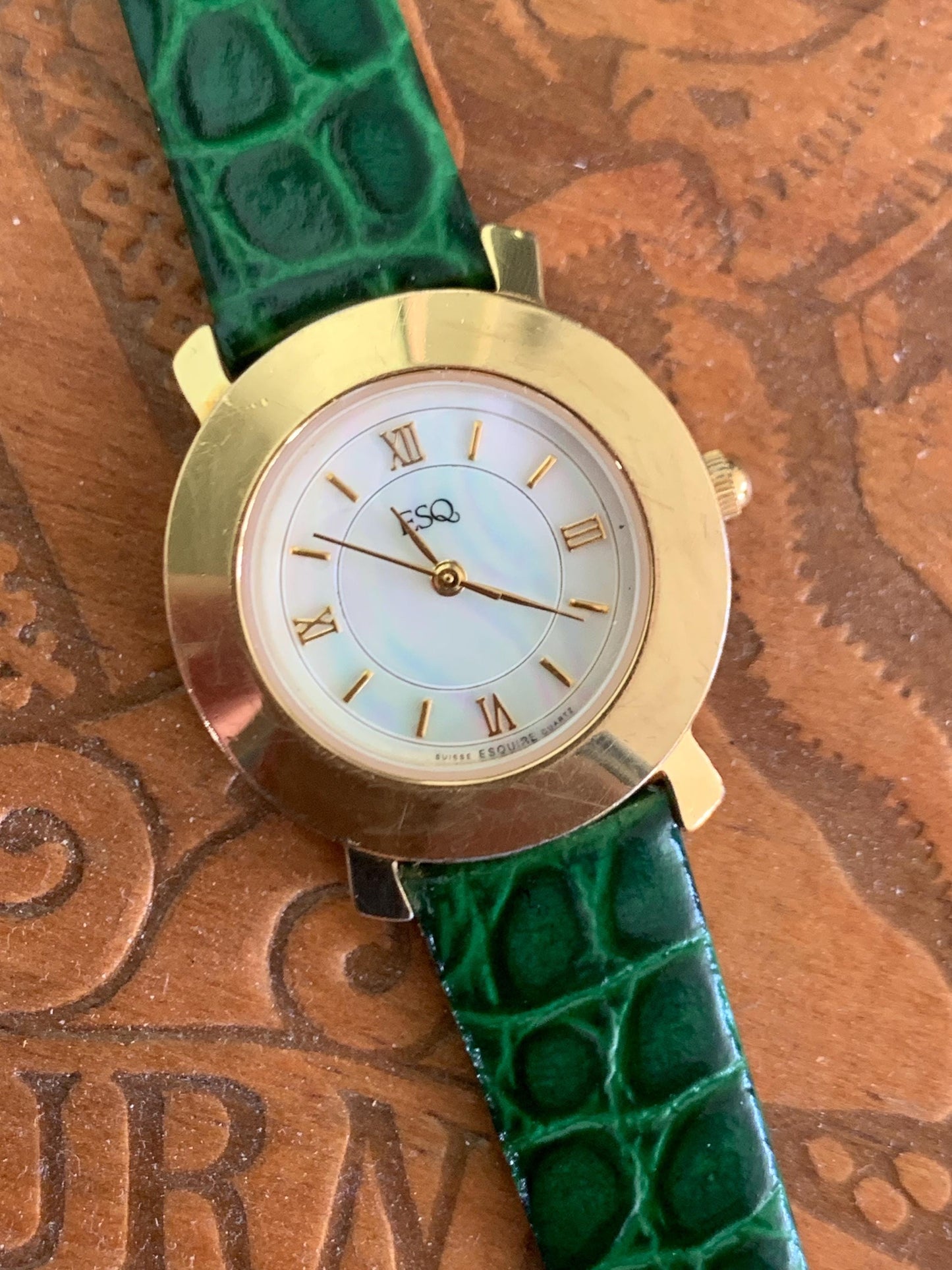 Modernist ESQ (by Movado) Roman Mother of Pearl Dial, Gold Tone Fancy Lugs, 90s, New Crocodile Pattern Green Band. 28mm. Swiss ETA Movement.