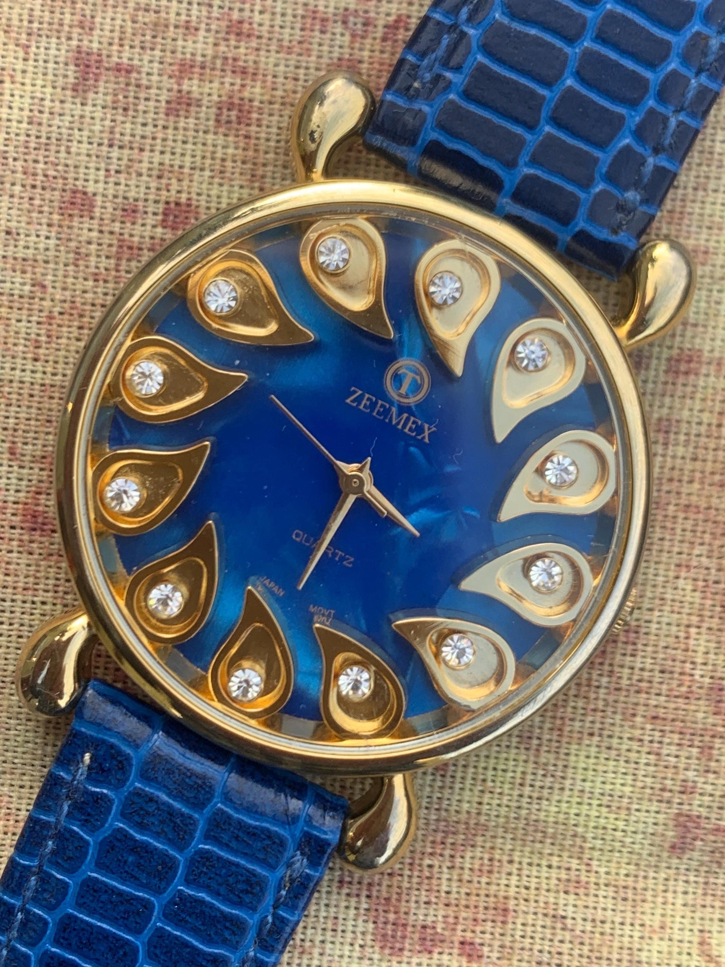 Luminescent Blue 1990s Quartz Watch - 37mm, Gold Indices with Floating Jewels on Ultra Radiant Blue Dial. New battery & NOS blue strap. Fun!