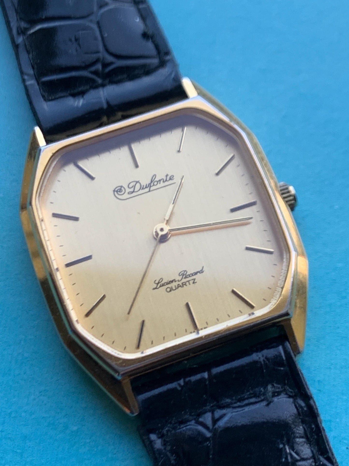Elegant Dufonte by Lucien Piccard Tank Watch: Goldtone Quartz with Brushed Golden Dial. 1980s/90s Fancy Dress Watch, NOS vintage black strap