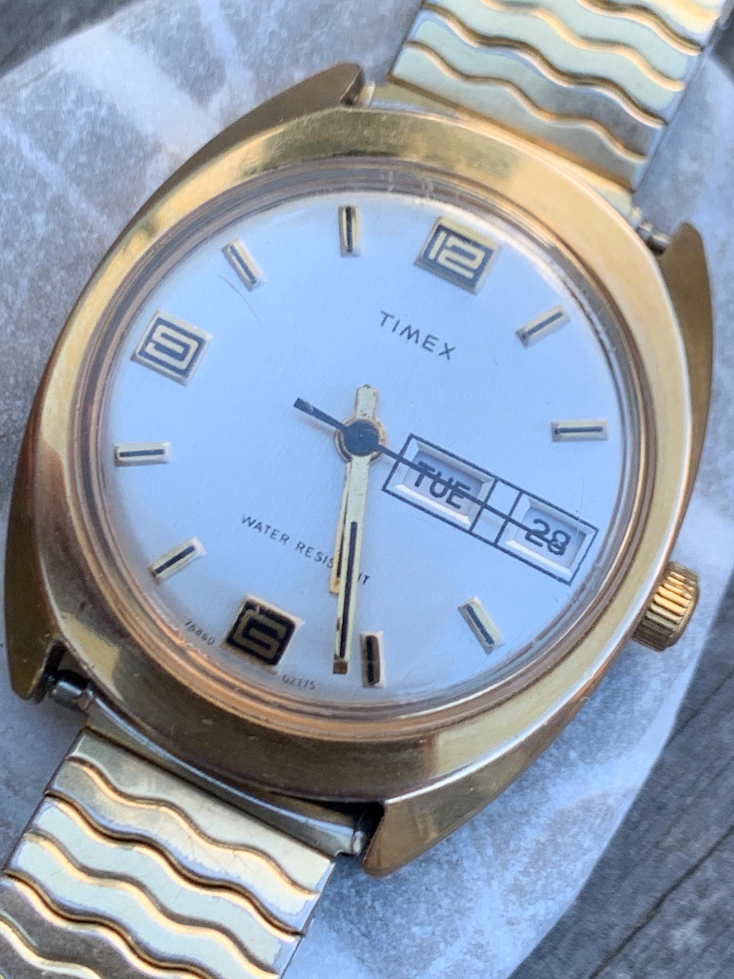 1975 Timex Marlin Winder Watch, Goldtone Case w/Champagne Calendar Dial. Decent Overall Condition with Period Expanding Band. Works!