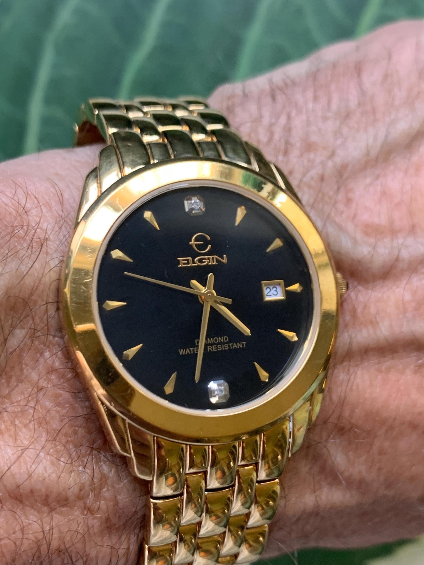 Elegant Elgin Diamond Dial Quartz Watch.  Gold Tone w black dial. Date. Classic 'Fancy' Retro Style. Bracelet. New battery. Great condition.