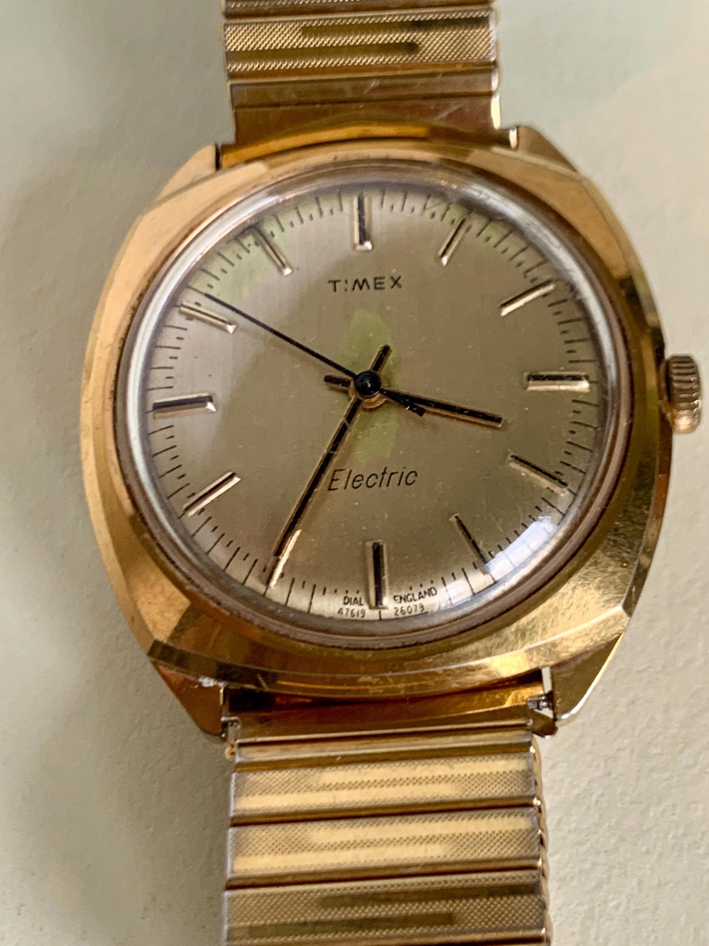 1979 England Dial Timex Electric Watch, Square-ish Goldtone Case w/Golden Dial. Decent Overall Condition with Period Expanding Band. Works!
