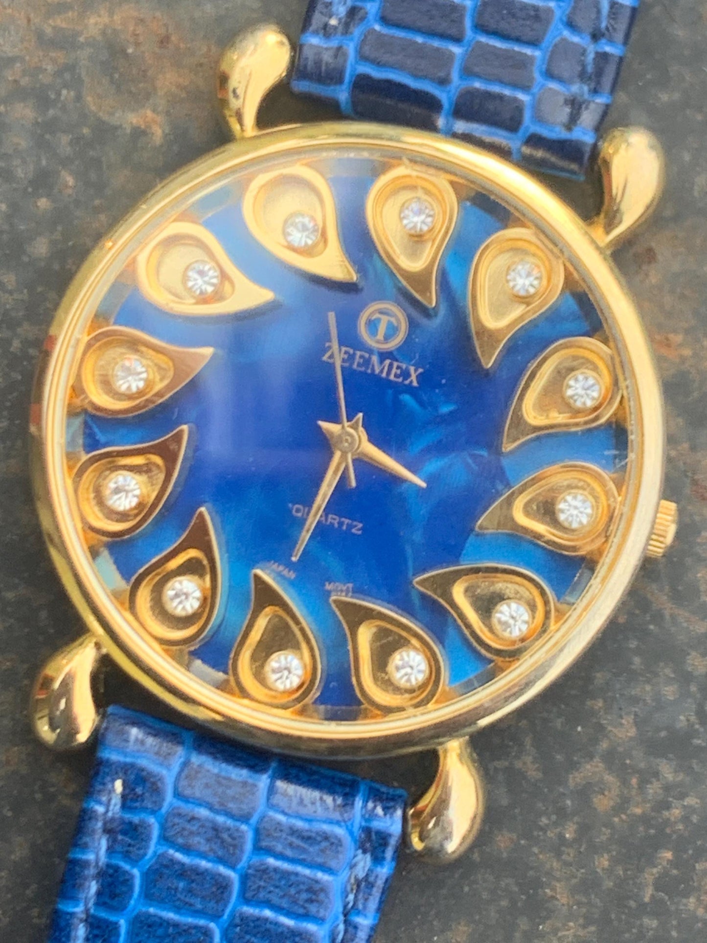 Luminescent Blue 1990s Quartz Watch - 37mm, Gold Indices with Floating Jewels on Ultra Radiant Blue Dial. New battery & NOS blue strap. Fun!