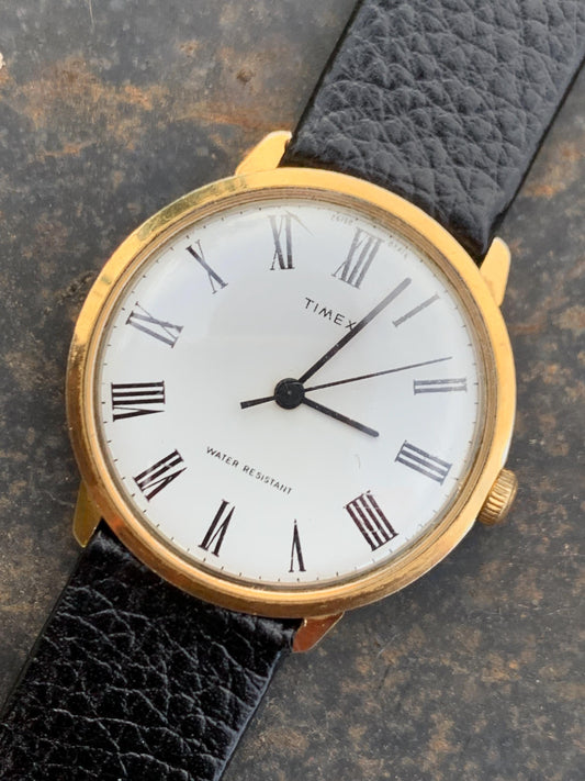 Classic 1976 Timex Marlin Roman Winder Watch. White Dial with Roman Numeral Indices. Good Condition Mechanical Winder, works. New Leather.