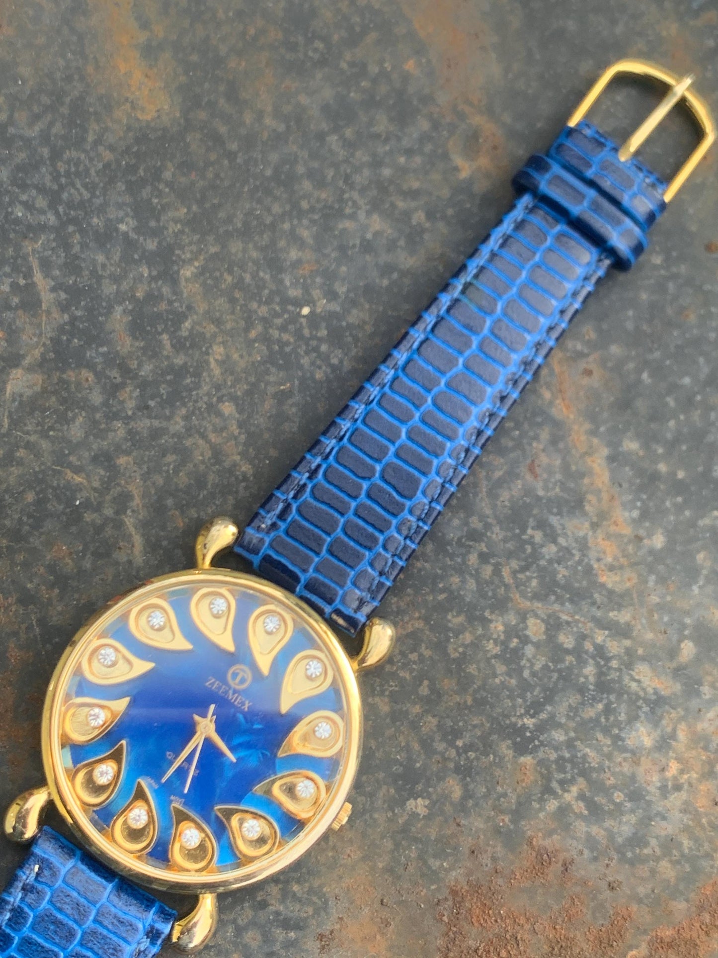 Luminescent Blue 1990s Quartz Watch - 37mm, Gold Indices with Floating Jewels on Ultra Radiant Blue Dial. New battery & NOS blue strap. Fun!