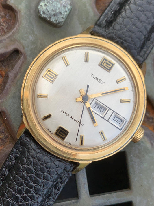 1976 Timex Marlin Winder Watch, Goldtone Case w/Champagne Calendar Dial and Mod Digits Decent Overall Condition w/New Leather Band. Works!