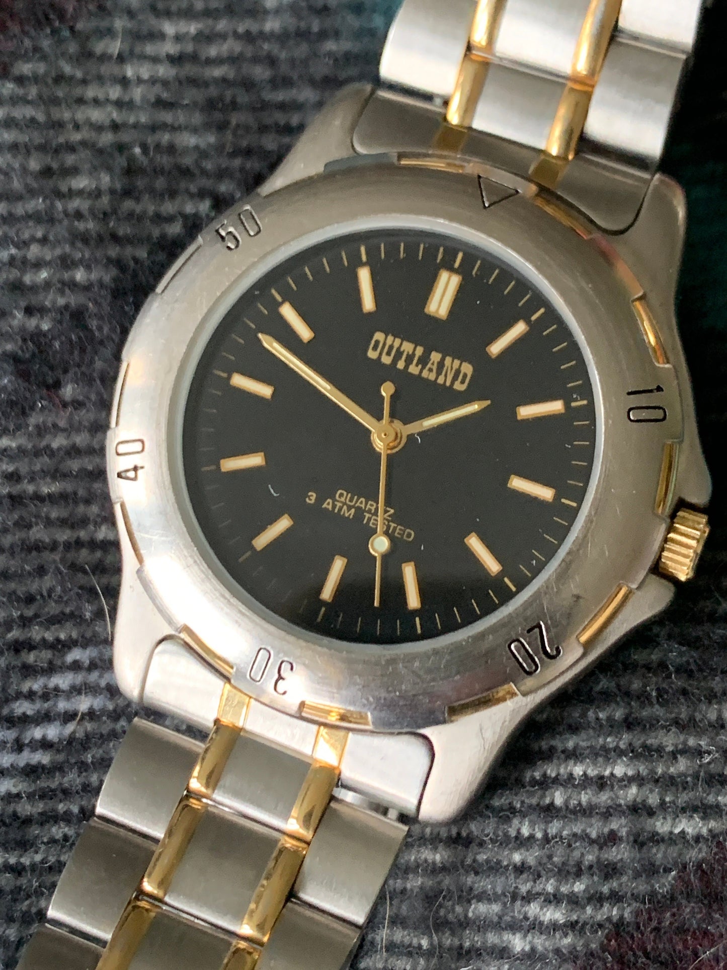 Outland Watch 1990s - Diver Style, Silver tone w/gold tone accents, Black Dial, Good Condition, Good Weight, Works Well. New Battery.