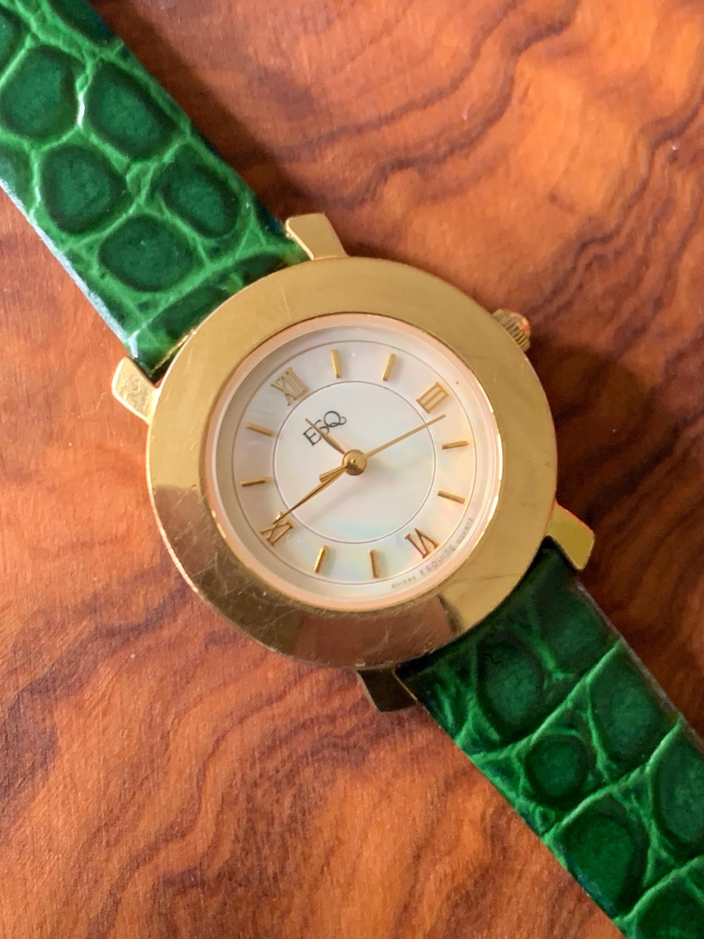 Modernist ESQ (by Movado) Roman Mother of Pearl Dial, Gold Tone Fancy Lugs, 90s, New Crocodile Pattern Green Band. 28mm. Swiss ETA Movement.