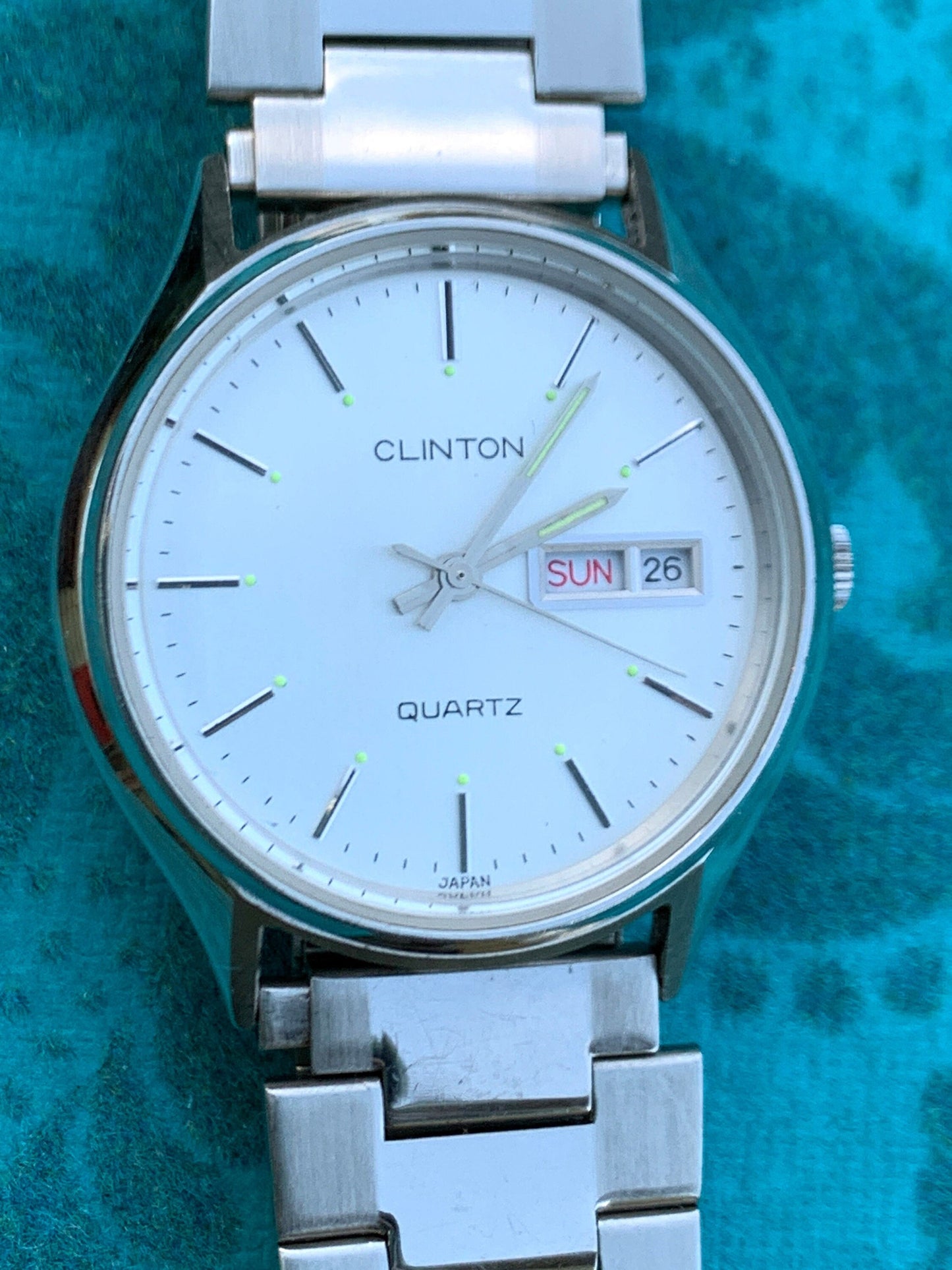 Unusual Rare 1970s Clinton Quartz Watch - Original High Polish Stainless Steel Calendar from Clinton Watch Co. Silver Dial, New Battery.