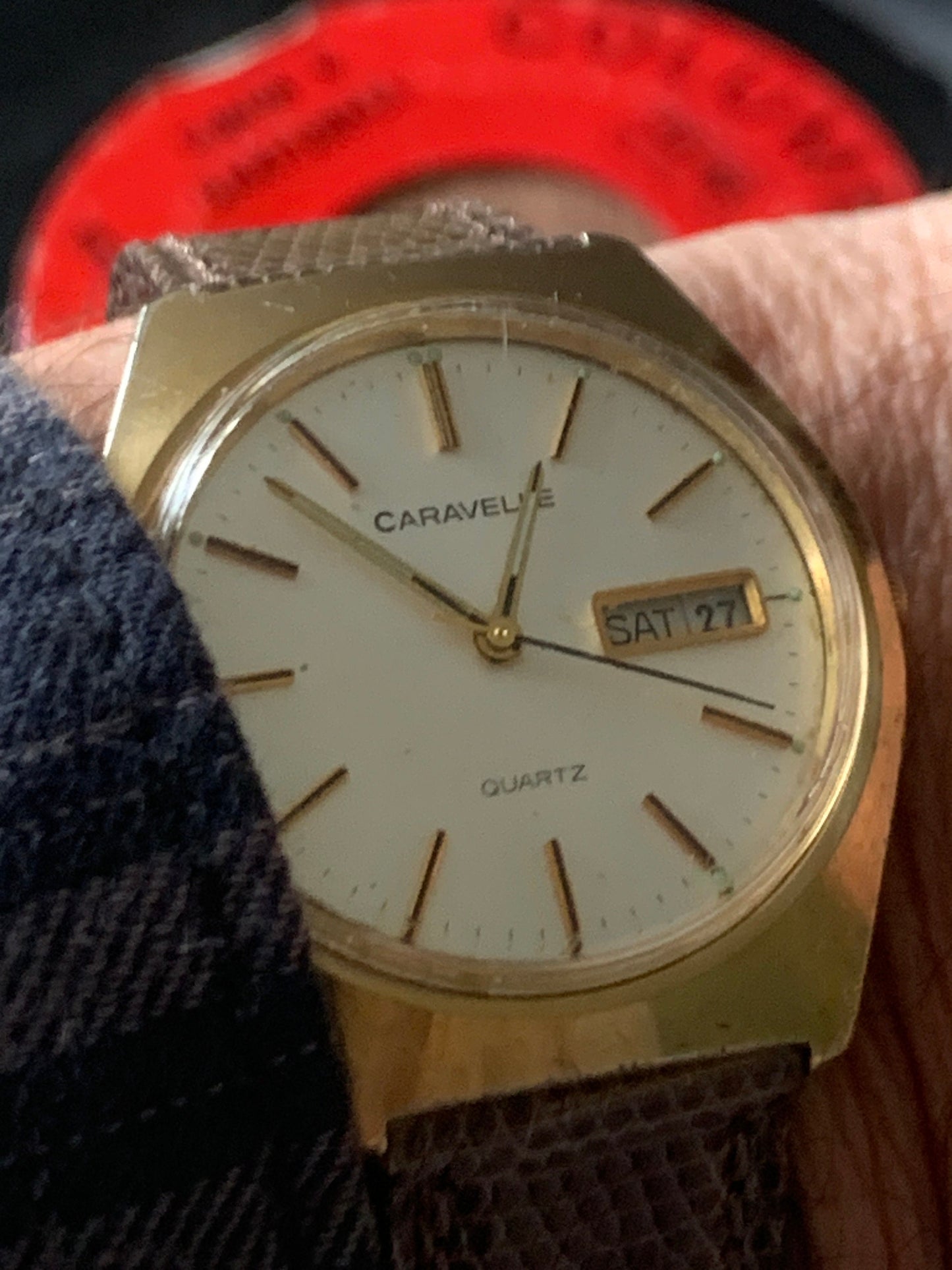 1980s Caravelle by Bolova Quartz Watch Gold Tone Finish, White Dial with Day/Date New battery. New Lizard Style Band. Overall Good Condition