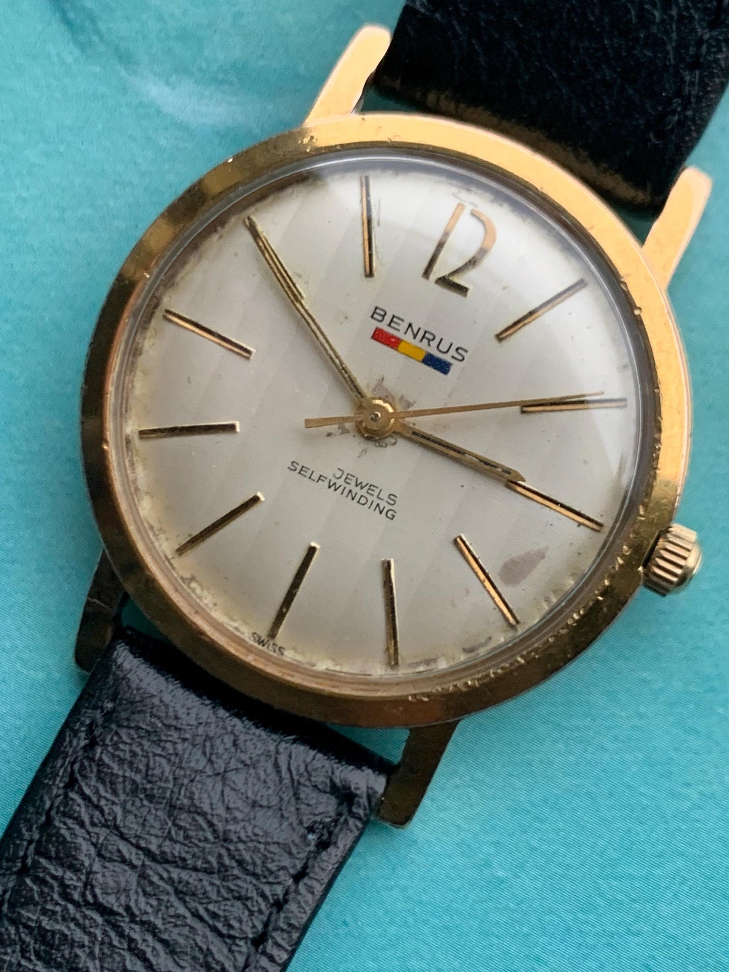 Late 1950s Benrus 7001 Citation Automatic. 10K Gold Plated in good working condition. Stick Indices Ribbed Dial. Self-winder w/vintage strap