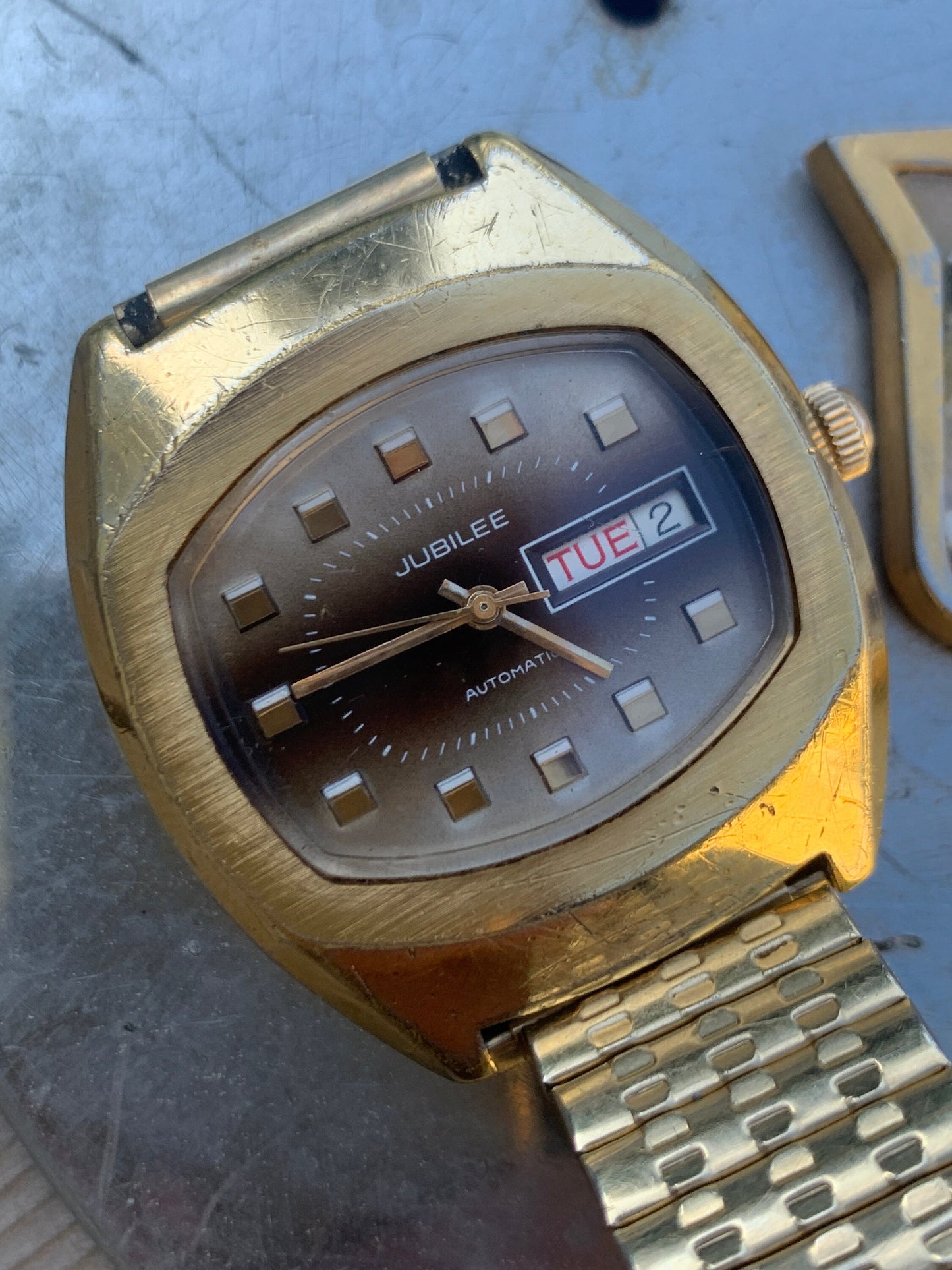 1970s Jublilee Automatic TV Style Watch with Day/Date. Fifty years of loving wear showing here and there. Great crystal, works, keeps time.