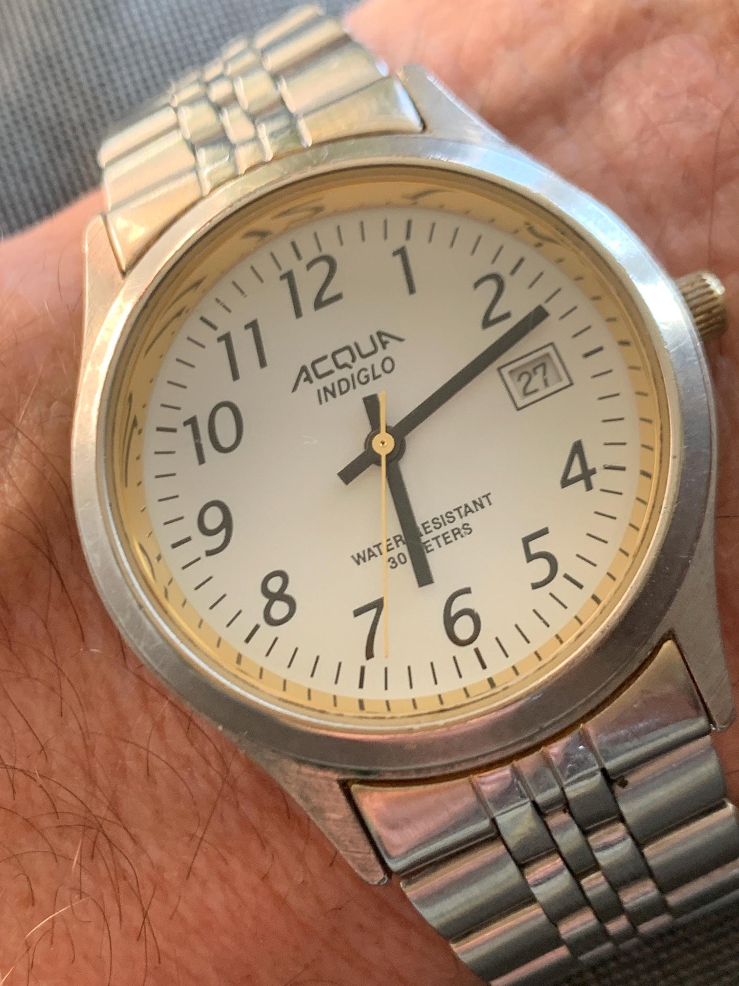 Well Worn Millennium Timex Acqua Indiglo Watch with White Dial, Easy Read Black Numerals, Date, and classic 70s style Retro Metal Strap.