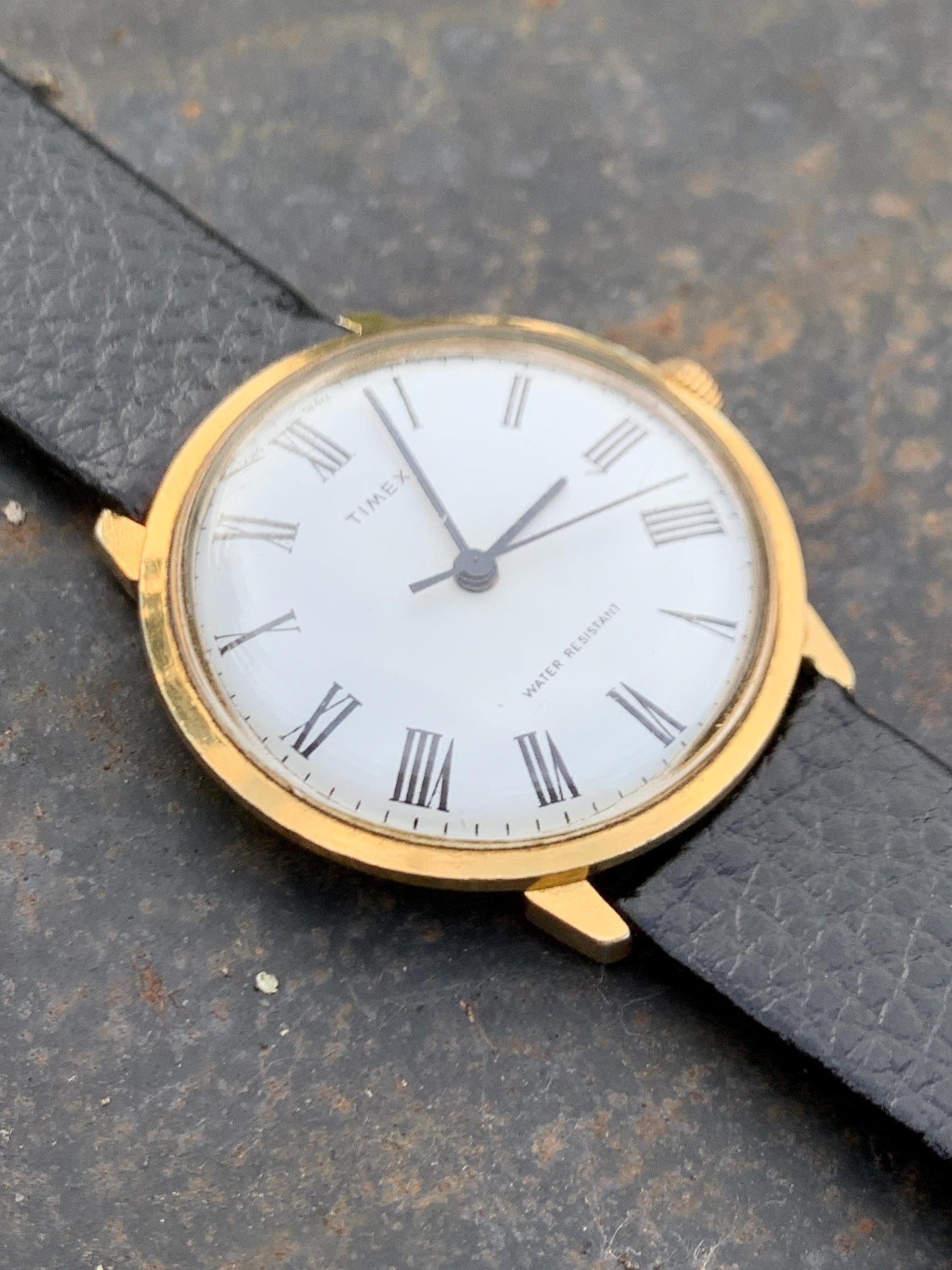 Classic 1976 Timex Marlin Roman Winder Watch. White Dial with Roman Numeral Indices. Good Condition Mechanical Winder, works. New Leather.