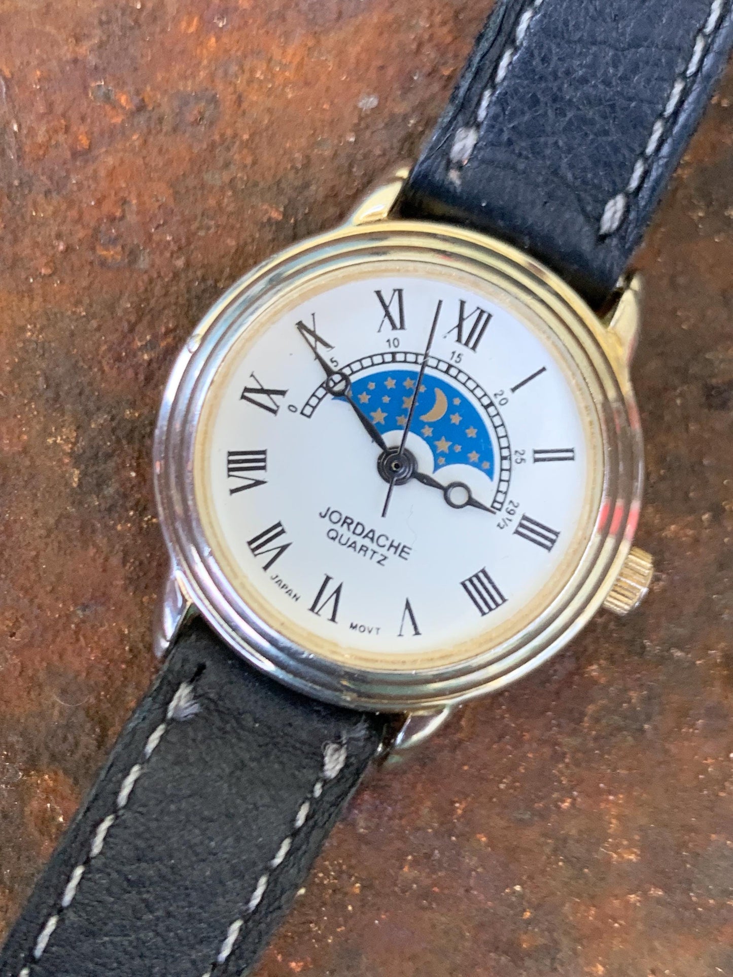 Jordache Moon Motif Watch - Women's FIXED Moon Motif Dial Design:  New battery, vintage leather strap. Roman Dial, Good Condition.
