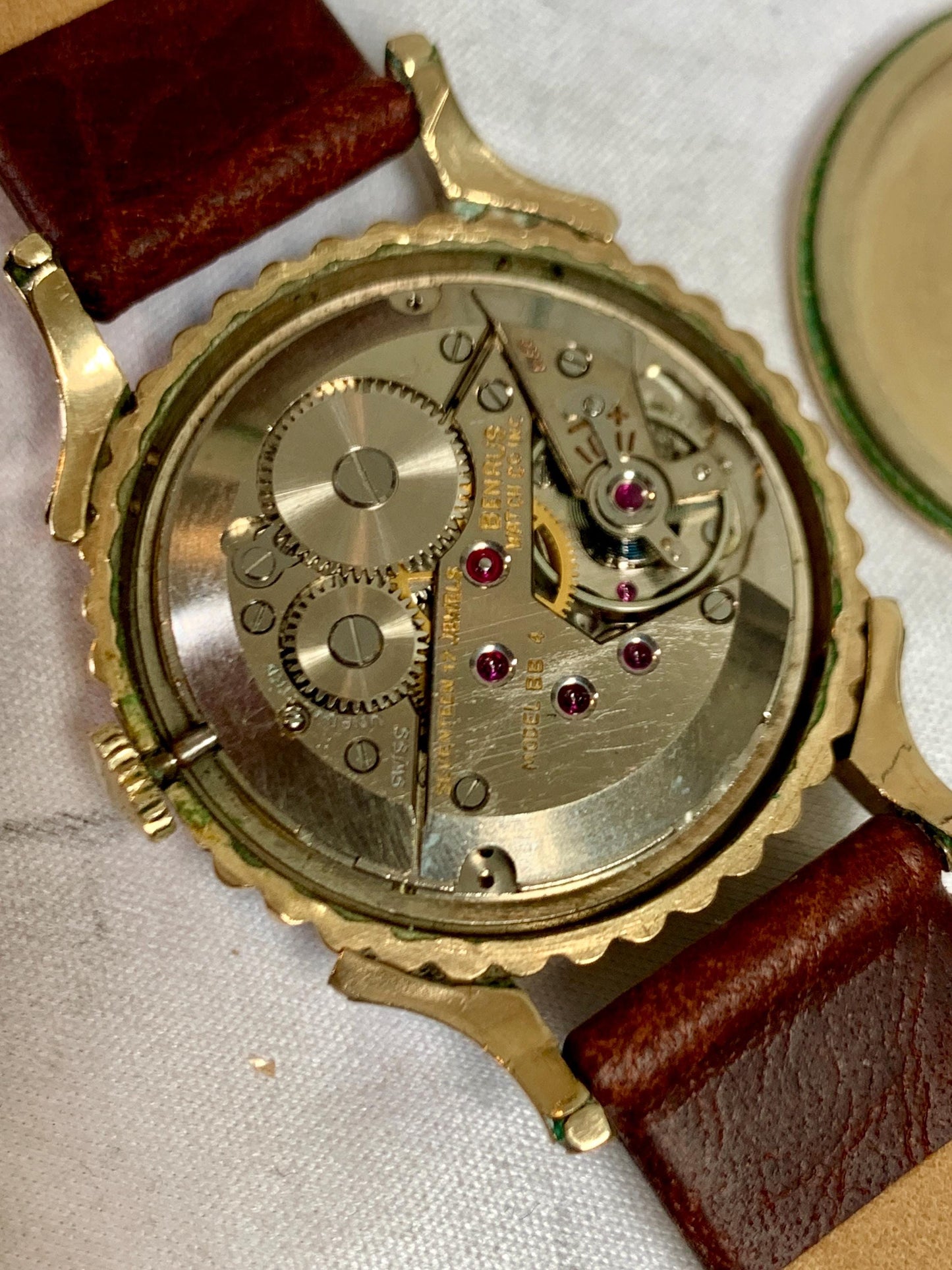 Rare 1950s Benrus Elegance 10K Gold-Filled "Bottlecap" Watch. 17 Jewels, in Excellent Condition. Fancy Horned Lugs and Sub-Second Hand.