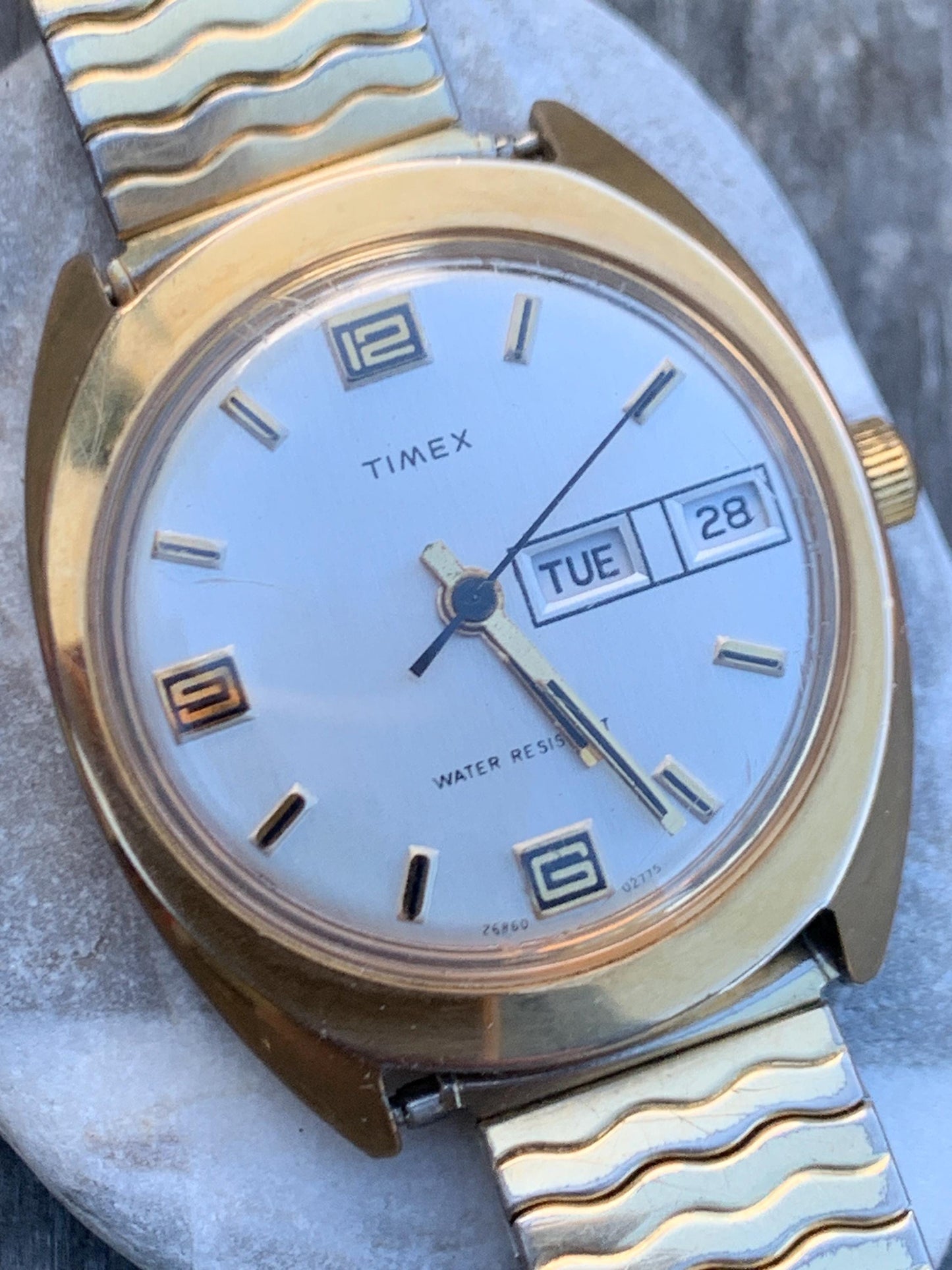 1975 Timex Marlin Winder Watch, Goldtone Case w/Champagne Calendar Dial. Decent Overall Condition with Period Expanding Band. Works!