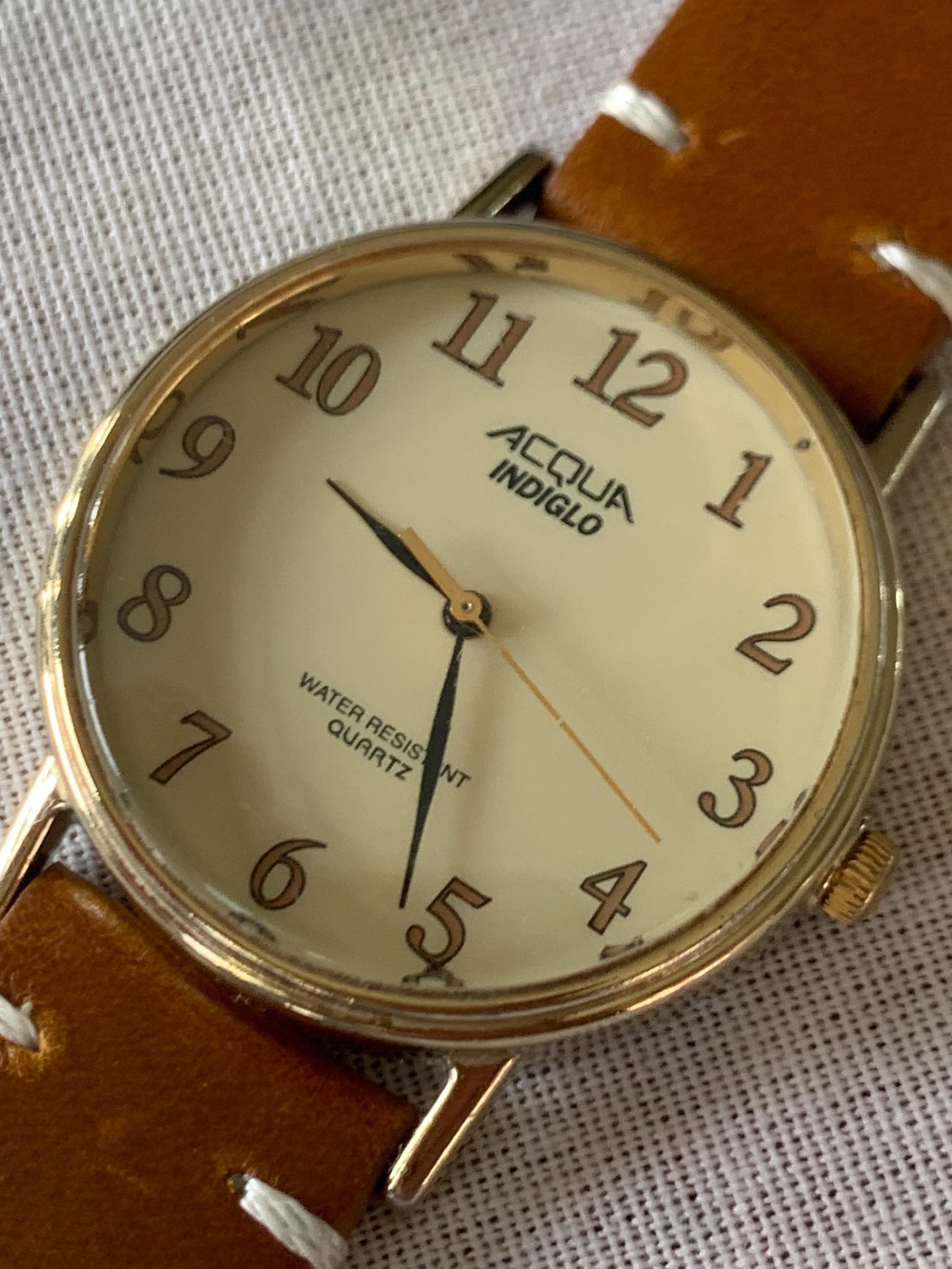 Creamy Retro 34.5mm Acqua by Timex Indiglo Quartz Watch. Goldtone. Y2K Survivor w/New Battery, New Classic Retro Light Brown Leather Strap.