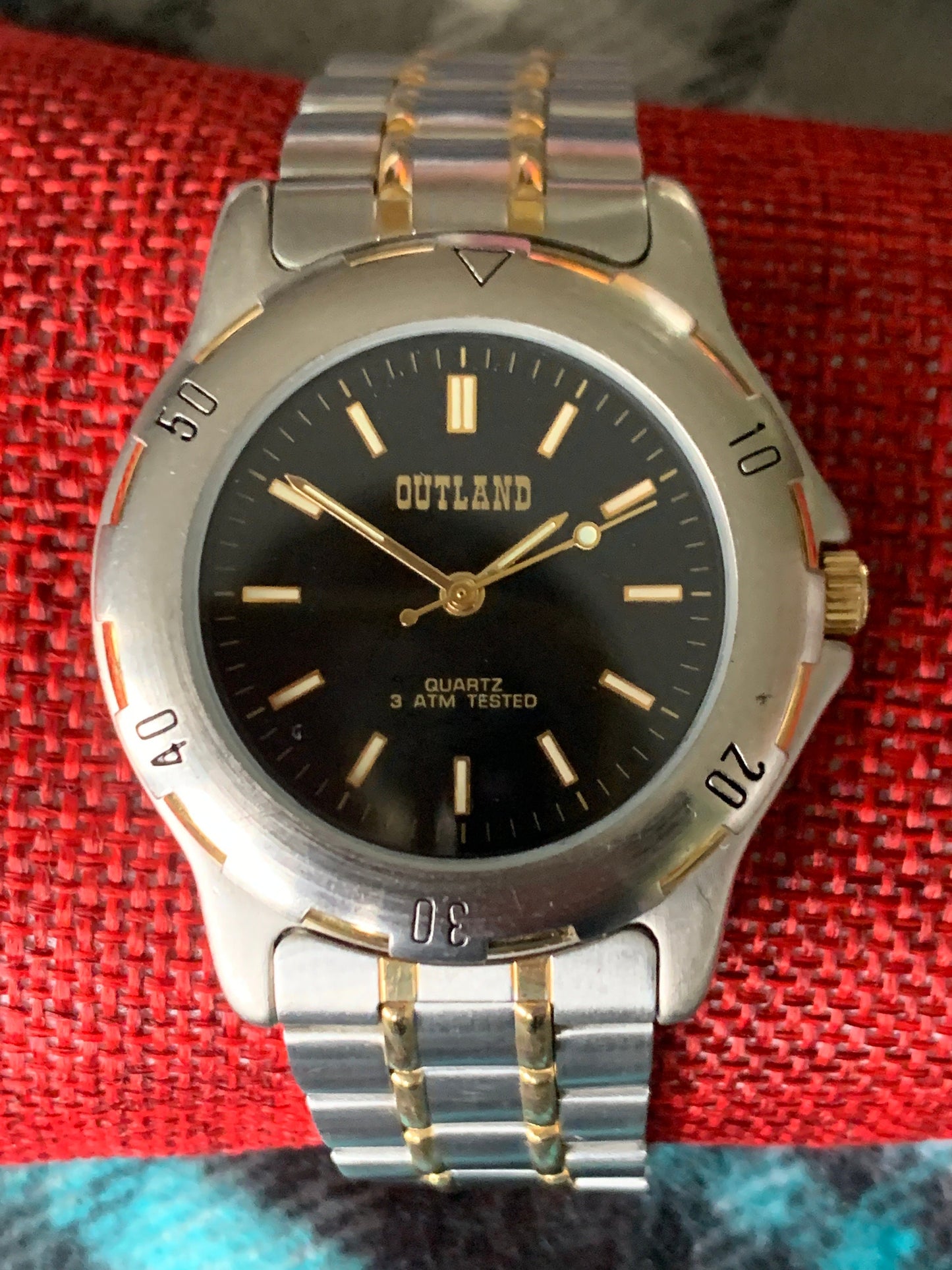 Outland Watch 1990s - Diver Style, Silver tone w/gold tone accents, Black Dial, Good Condition, Good Weight, Works Well. New Battery.