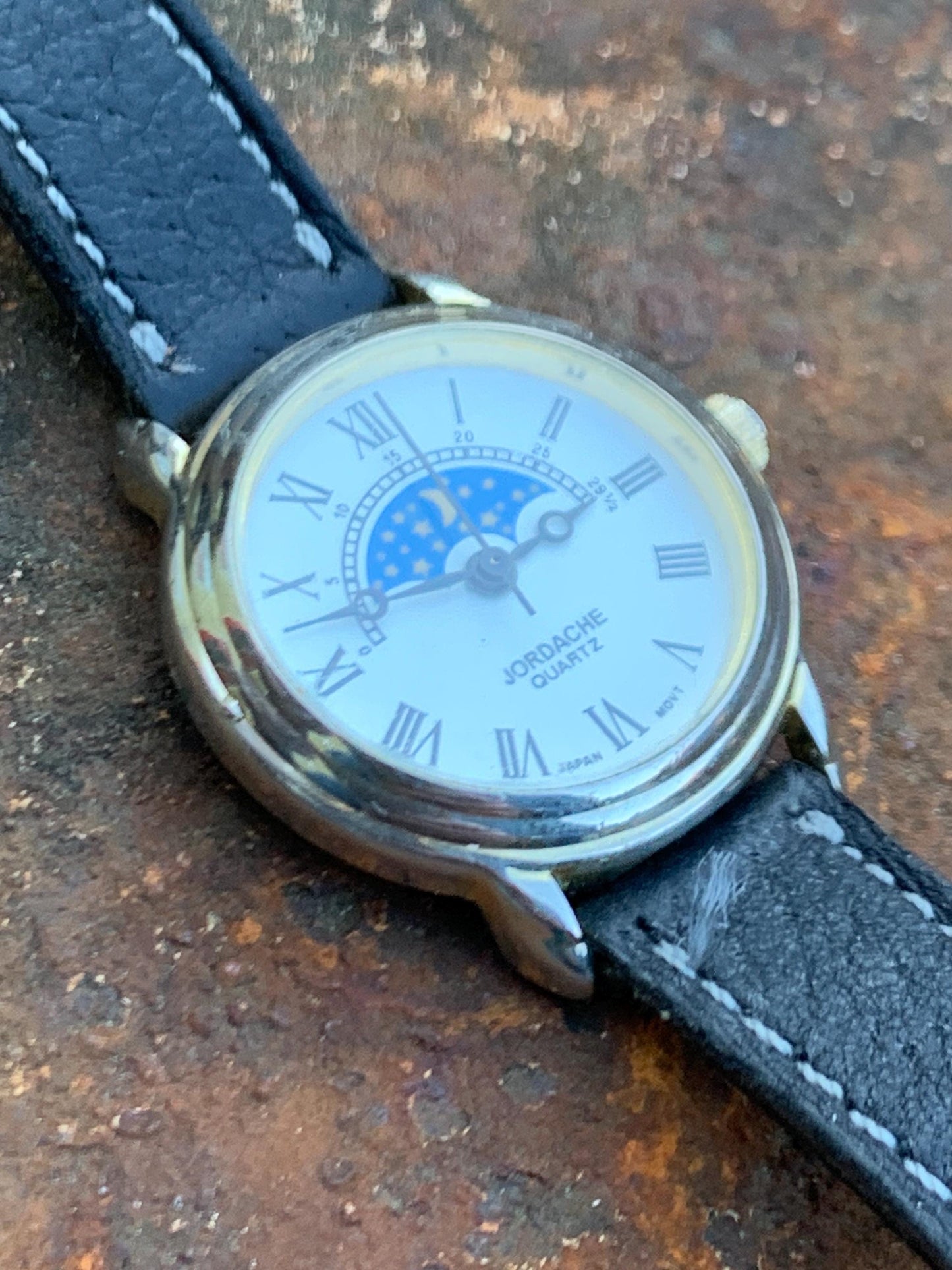 Jordache Moon Motif Watch - Women's FIXED Moon Motif Dial Design:  New battery, vintage leather strap. Roman Dial, Good Condition.